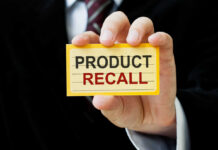 RECALL: Hidden Flaw Sparks Home Fire Fears Hand holding a product recall card