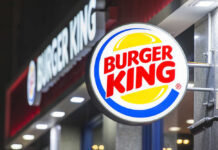 Illuminated Burger King sign at night