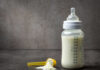 PARENTAL ALERT: Baby Bottles Recalled A baby bottle filled with milk next to a scoop of powdered formula