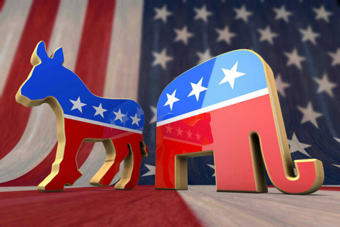 shutterstock_114868483 Donkey and elephant symbols with American flag background.