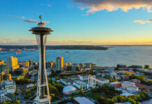 Space Needle overlooking Seattle waterfront at sunset