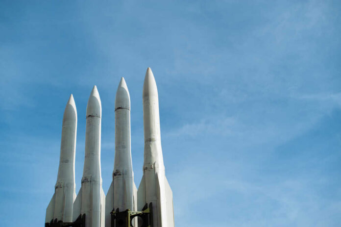 Several,Combat,Missiles,Aimed,At,The,Sky.,Missile,Weapons.,Nuclear Aircraft carrier on open sea with parked planes