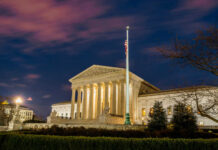 Supreme Court Meltdown: Trust Hits Rock Bottom The United States Supreme Court building at dusk.