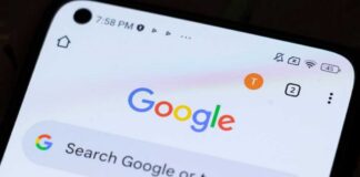 Close-up of a smartphone displaying the Google search interface