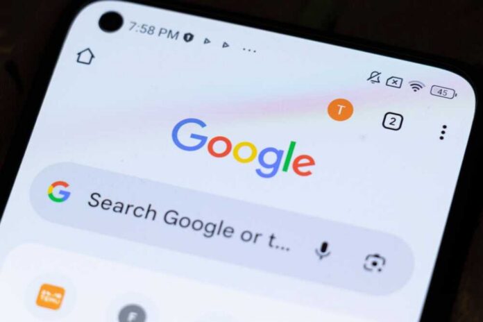 Close-up of a smartphone displaying the Google search interface
