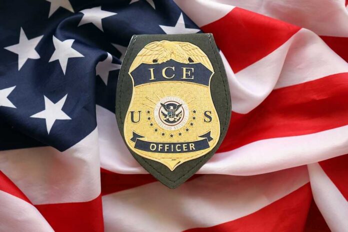 Kyiv,,Ukraine,-,September,17,,2025,Us,Ice,Officer,Badge ICE officer badge placed on an American flag