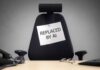 Empty office chair with a sign pinned to the backrest