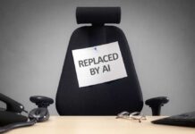 9,000 Jobs Vanish in ‘Future-Ready’ Overhaul Empty office chair with a sign pinned to the backrest