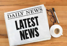 Pentagon Math Sparks Outrage Newspaper with headline latest news on table