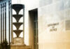 Exterior view of the Department of Justice building with architectural features