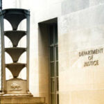 DOJ vs. Judge: Smuggling Case REVIVED? Exterior view of the Department of Justice building with architectural features