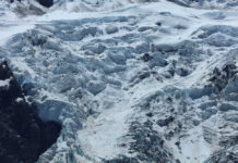Glacier Ghosts Emerge After 34 Years Snowy mountain landscape with glacial ice and rocks