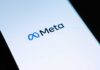 Meta’s $18 Billion Gut-Punch Meta logo on a smartphone screen