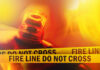 Firefighting Chopper Down — Rescuers Blocked Firefighter emergency light with fire line tape