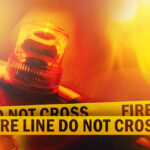 Firefighting Chopper Down — Rescuers Blocked Firefighter emergency light with fire line tape