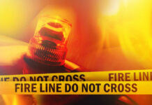 Firefighting Chopper Down — Rescuers Blocked Firefighter emergency light with fire line tape