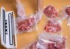 Border Blunder Triggers Massive Beef Recall Hands wearing gloves vacuum sealing meat in plastic bags