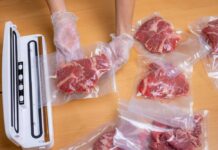 Border Blunder Triggers Massive Beef Recall Hands wearing gloves vacuum sealing meat in plastic bags