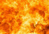Bright orange and yellow flames burning intensely.