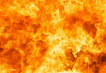 Bright orange and yellow flames burning intensely.