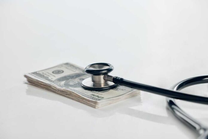 Bank,Note,,Stethoscope,And,Money,For,Healthcare,With,Hospital,Budget,