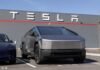 Tesla Slammed: 3M Cars Pulled Tesla Cybertruck parked in front of a Tesla dealership