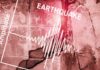 Latin Icons Rally For Disaster Relief Seismograph showing earthquake amplitude on a cracked wall