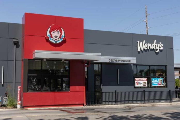 Exterior view of a Wendy's restaurant featuring a delivery pickup area