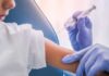 Pediatricians Revolt After Vaccine Shake-Up A healthcare professional administering a vaccine to a child's arm