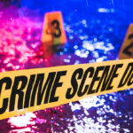 Buried Alive? Influencer Found in Suitcase Crime scene tape with blurred evidence markers.