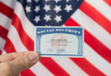 Retire at 60? Congress Floats Shock Move Hand holding social security card, American flag background.