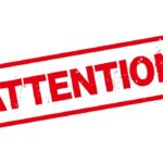 Red stamp with the word 'ATTENTION' in bold letters