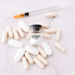 Fentanyl Bombshell: Hollywood Star Overdosed Fentanyl citrate vial surrounded by various pills and syringe.