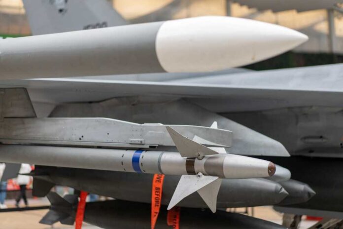 Airplane,Missile,Launcher,Close,Up.,War,Concept. Missile mounted under a fighter jet wing