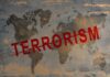 Terror Plot At U.S. Military Base?! World map with the word TERRORISM crossed out in red