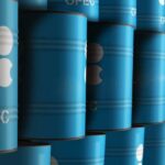 Blue oil barrels stacked in rows with OPEC logo
