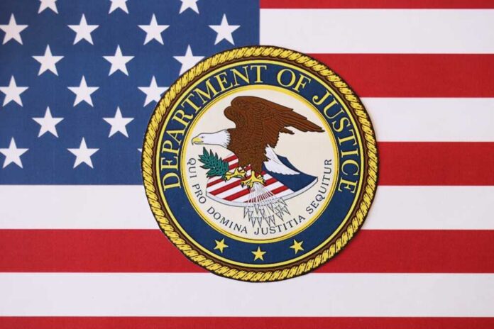 Kyiv,,Ukraine,-,March,9,,2024,Us,Department,Of,Justice Department of Justice seal on American flag background