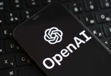AI Misfires Exposed – OpenAI To Blame?! Smartphone displaying OpenAI logo on a keyboard