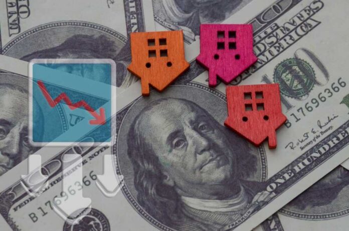 A,Declining,Graph,Next,To,A,House,Symbolizes,The,Downturn Colorful house icons on a background of hundred dollar bills with a downward trend graph