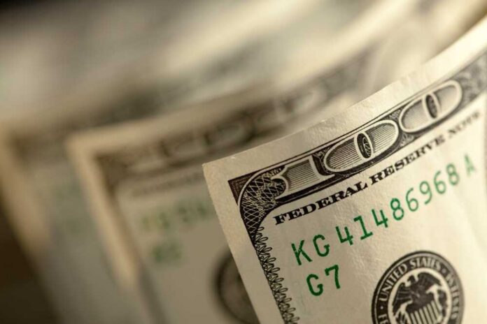 Abstract,Of,One,Hundred,Dollar,Bills,With,Narrow,Depth,Of Close-up of a stack of hundred dollar bills