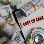 Bundles of cash next to a stethoscope and a note that says 'COST OF CARE'