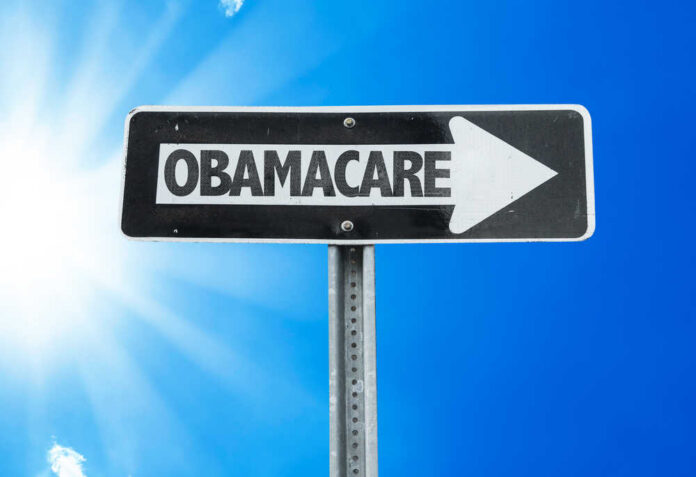 Obamacare,Direction,Sign,With,A,Beautiful,Day