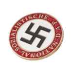 GOP Erupts Over ‘Nazi’ Bombshell Accusation Nazi party badge with swastika on white circle and red border