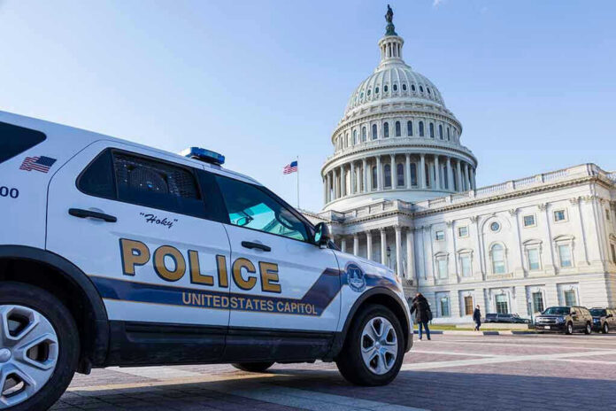 Police vehicle outside United States Capitol building.