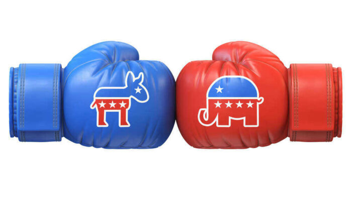 Blue donkey and red elephant boxing gloves facing off.