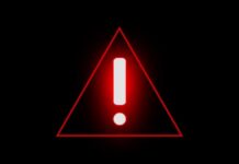 Web Backbone EXPOSED Red warning triangle with exclamation mark on black background