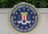 FBI seal featuring stars and laurel leaves