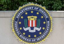 NOW: FBI Boss Accused FBI seal featuring stars and laurel leaves