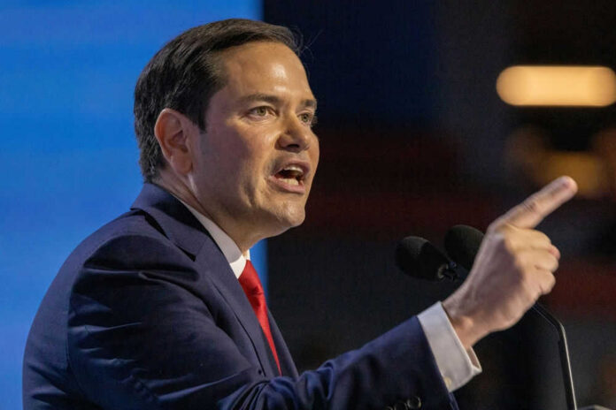 shutterstock_2524664237 Marco Rubio speaking at a podium, pointing while addressing an audience