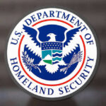 DHS Targets Democrat U.S. Department of Homeland Security logo.